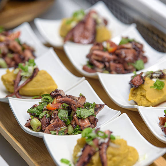 Close up of gourmet seafood dishes and fresh salads at the hotel restaurant