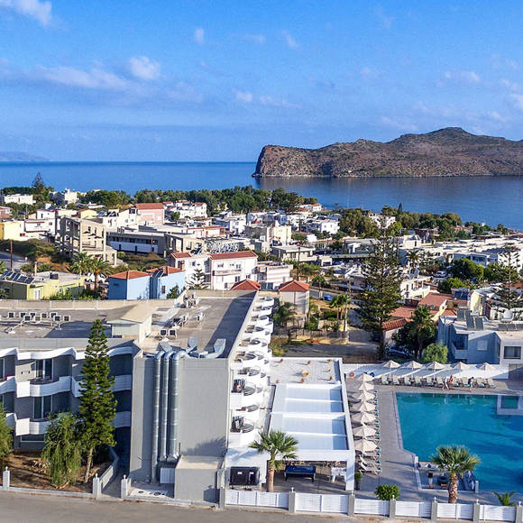 Aerial view of Dore Hotel near the beach with Thodorou Island in the background